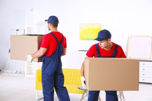 Furniture collection team handling a sofa pick-up in Croydon