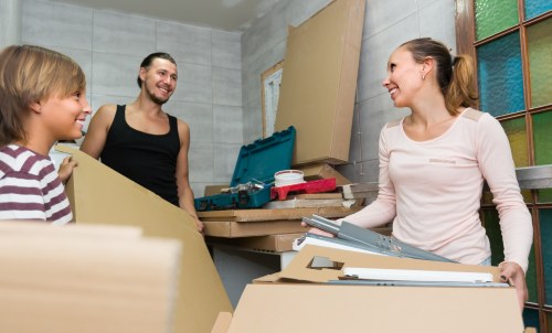 Removal van and moving boxes prepared for a Croydon home move