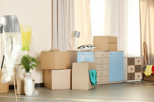 Removal team sorting recyclable items during a Croydon clearance