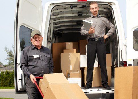 Packed boxes and wrapped furniture ready for removals in Croydon