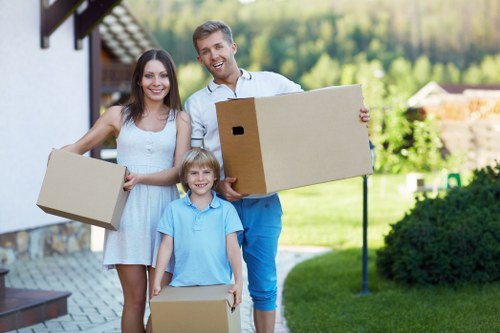 Packed boxes and furniture ready for collection in Croydon