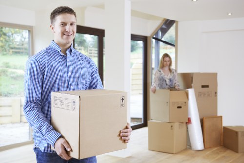 Packed boxes and furniture ready for collection in Croydon