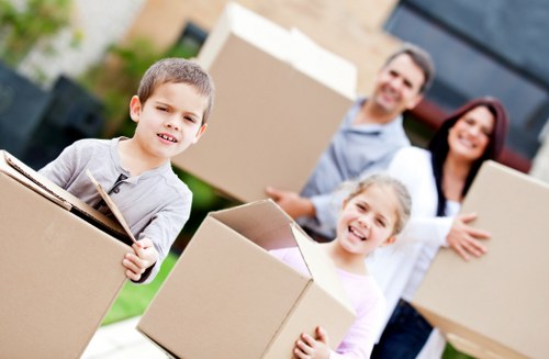 Local moving team transporting bulky furniture in Croydon