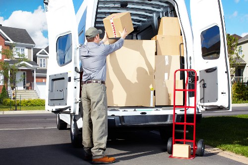 Furniture and boxes being loaded during a home move in Croydon
