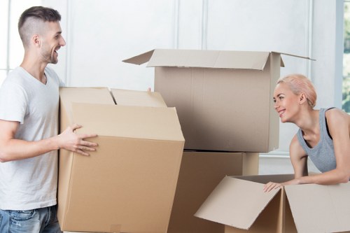 Moving team assessing load-based pricing for a flat in Croydon