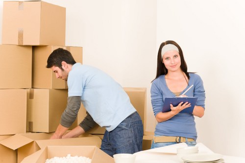 Furniture being moved from a Croydon property with staircase access